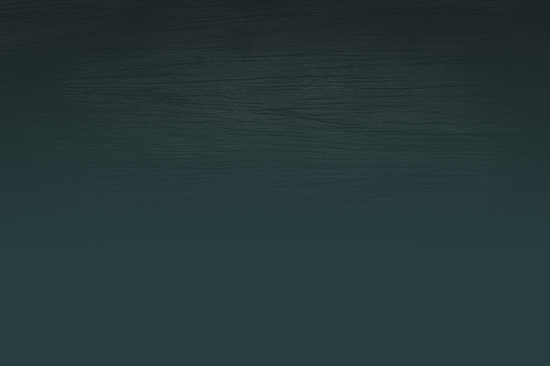 A textured black background with subtle variations, resembling a wooden surface, creates a minimalist and dark visual aesthetic.