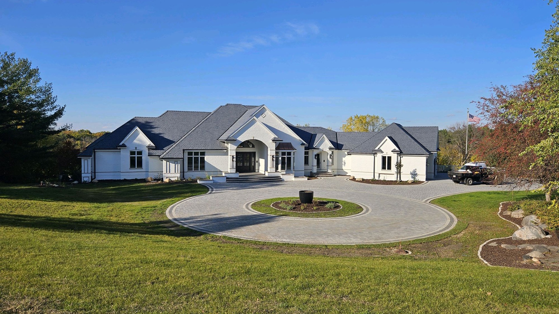 The front of a house using landscaping ideas to keep it looking fresh and beautiful.