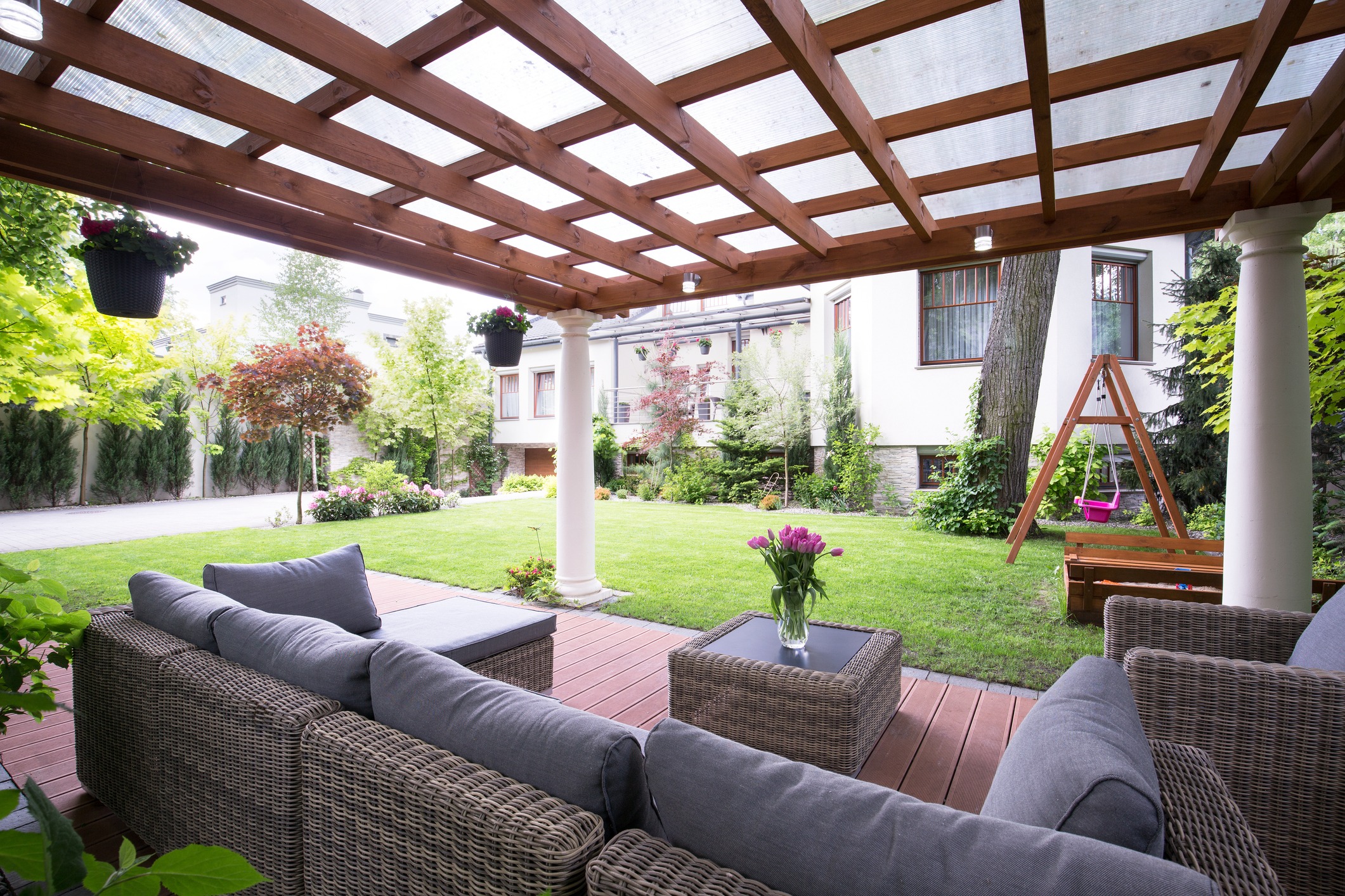 Designed modern arbor with comfortable garden furniture