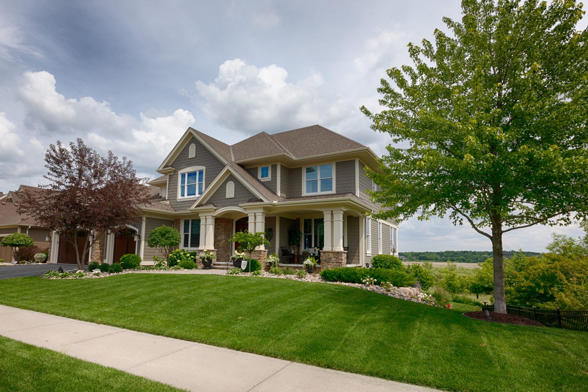Residential home with healthy front lawn.