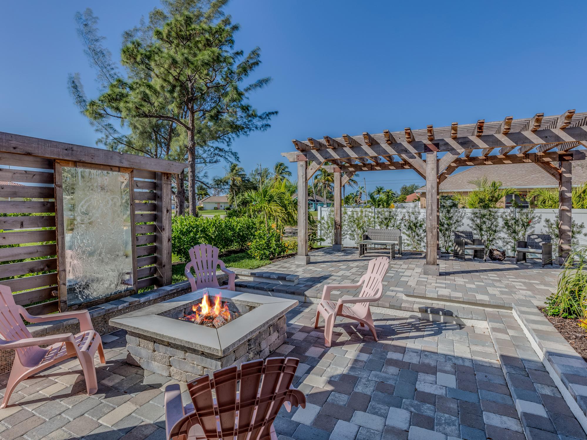 Unique wall and stone pavers make up wonderful entertaining area